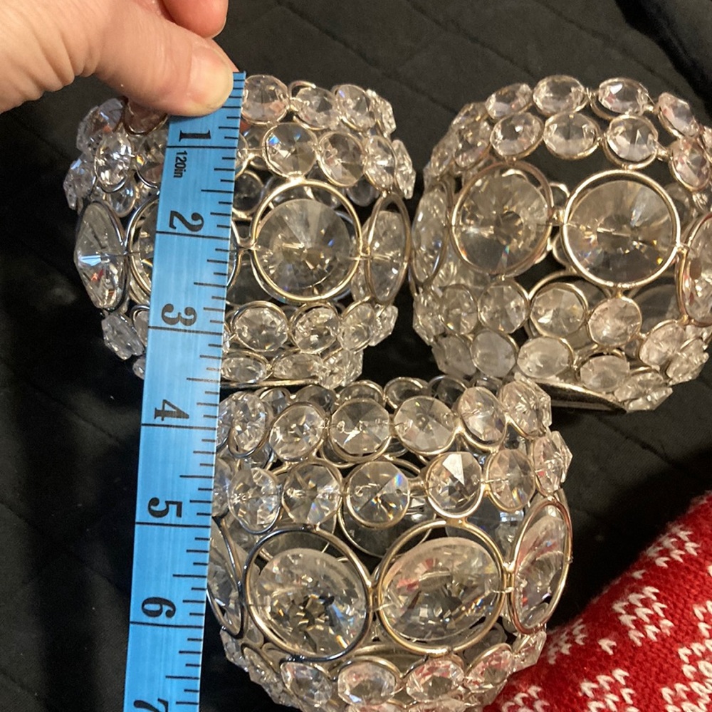 Three used candle holders